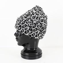 Read the image into the gallery view, BEANIE LEO WHITE
