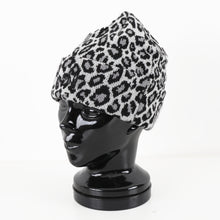 Read the image into the gallery view, BEANIE LEO WHITE
