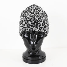 Read the image into the gallery view, BEANIE LEO WHITE
