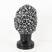Read the image into the gallery view, BEANIE LEO WHITE

